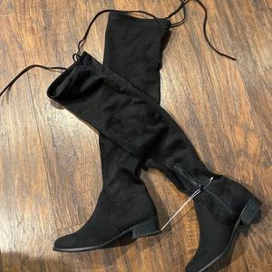 Black tall boots. Brand new never worn.